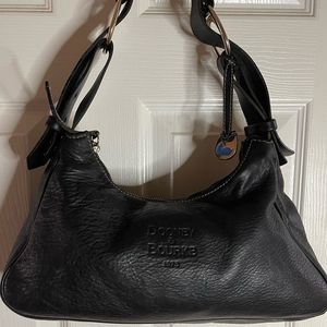Dooney & Bourke black leather shoulder bag with bold gold tone hardwares